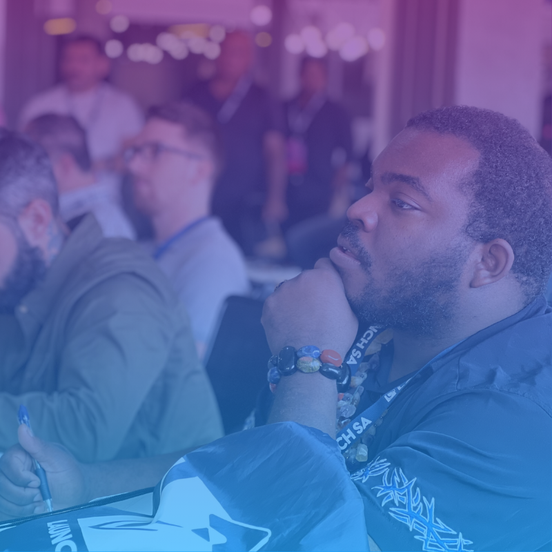 Attendees listening to a talk